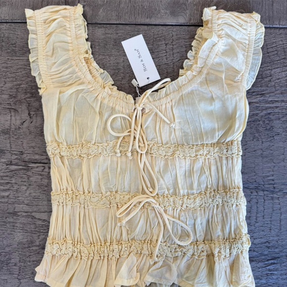 Sim & Sam Butter Yellow Tie Front Ruffle Lace Top
Small NWT Cottagecore - Picture 2 of 7